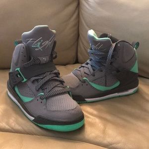 Gray and mint green Jordan’s